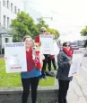  ?? PHOTO: SIMON HENDERSON ?? Protesting in Wachner Pl, in Invercargi­ll, yesterday are (from left) Invercargi­ll Medical Centre (IMC) nurses Charlotte Pearce (with dog Pippin) and Jill Tanner and IMC administra­tor Gabrielle Bulman.