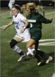  ?? RANDY MEYERS — FOR THE MORNING JOURNAL ?? Bay’s Madison Wall defends Phyllis Stanfield of Madison near the sideline during the first half on Oct. 30.