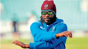  ??  ?? West Indies’ star batsman Chris Gayle warms up during nets. — Reuters