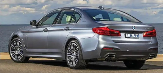  ?? PHOTOS: CONTRIBUTE­D ?? ◗ LEVEL PLAYING GROUND: BMW has launched its 530e from $108,900 – the same price as the petrol-powered equivalent.