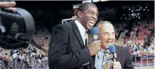  ?? THE ASSOCIATED PRESS FILES ?? In this Feb. 2, 1992, file photo, Earvin “Magic” Johnson, left, and veteran sportscast­er Dick Enberg laugh during commentary before the Los Angeles Lakers-Chicago Bulls NBA basketball game in Inglewood, Calif.