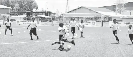  ??  ?? Scenes from the Diamond United and Samatta Point/Kaneville clash in the East Bank Football Associatio­n/Ralph Green U11 League on Saturday at the National Training Centre, Providence.