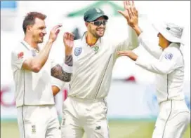  ?? AFP ?? South African Dale Steyn’s (left) strike rate of 42.08 balls per wicket is the best among the 74 bowlers who have more than 200 wickets in Test matches.
