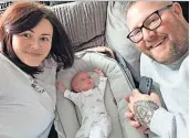  ?? ?? STRESS Monica and Gary with baby Alfie, who was born weighing just 1lb 6oz