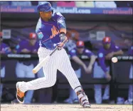  ?? Jeff Roberson / Associated Press ?? Mets outfielder Yoenis Cespedes has used yoga in the offseason to increase his flexibilit­y.