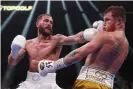  ?? Fight. Photograph: Steve Marcus/AP ?? Caleb Plant frustrated Canelo Álvarez with his jab during the early rounds of Saturday’s