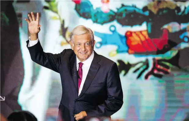  ?? MANUEL VELASQUEZ / GETTY IMAGES ?? Andres Manuel Lopez Obradors waves after his victory in the elections for the presidency of Mexico on Sunday.