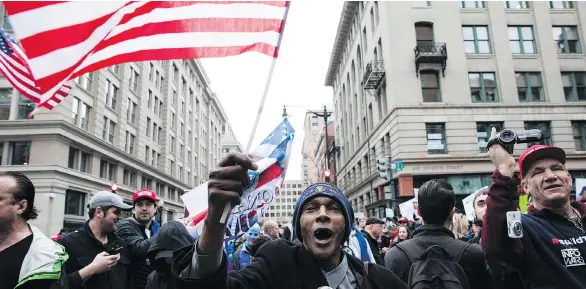  ?? ZACH GIBSON/AFP/GETTY IMAGES ?? Donald Trump’s inaugurati­on remarks about other countries “making our products and destroying our jobs,” struck a chord with his supporters.