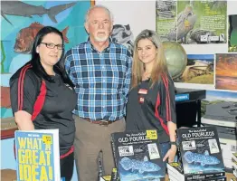  ?? Picture: ETHIENNE ARENDS ?? FISHY TALE: Mike Bruton is joined by Marlea Reid, left, and Tarryn Cloete from Bargain Books in Beacon Bay for the launch of ‘The Annotated Old Fourlegs: The Updated Story of the Coelacanth’ on Saturday. Bargain Books organised the launch