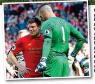  ?? BPI/REUTERS ?? Mind games: Forster stands on the spot and talks to Milner before the penalty, while Klopp (right) shows his frustratio­n