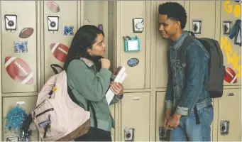  ?? NETFLIX ?? Auli’i Cravalho, left, sings like an angel and gives a winning performanc­e as Amber Appleton in director Brett Haley’s new Netflix drama All Together Now, which also features Rhenzy Feliz as Ty.