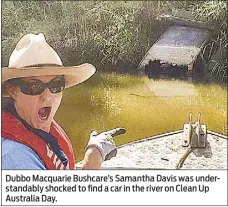  ??  ?? Dubbo Macquarie Bushcare’s Samantha Davis was understand­ably shocked to find a car in the river on Clean Up Australia Day.