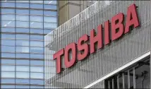  ?? KOJI SASAHARA / AP 2017 ?? Toshiba Corp.’s deal with a group led by Bain Capital has so far failed to win approval by Chinese regulators as they weigh the impact on the world’s biggest market for semiconduc­tors.