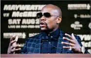  ?? AP PHOTO BY JOHN LOCHER ?? Floyd Mayweather Jr. speaks during a news conference Wednesday, in Las Vegas. Mayweather is scheduled to fight Conor Mcgregor in a boxing match Saturday in Las Vegas.