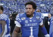  ?? NELL REDMOND — THE ASSOCIATED PRESS, FILE ?? Kentucky quarterbac­k Lynn Bowden Jr. stands on the field after leading his team to a 37-30victory over Virginia Tech in the 2019Belk Bowl in Charlotte, N.C.