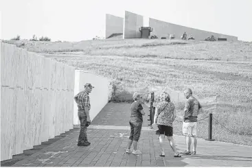  ?? Nicole Bengiveno / New York Times ?? The $26 million visitor center and museum in Shanksvill­e, Pa., which documents the crash of Flight 93, the jetliner hijacked by terrorists aiming for Washington, D.C., opens on Thursday, 14 years after Sept. 11, 2001.