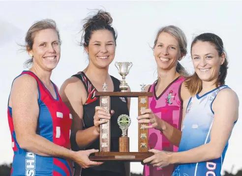  ?? Picture: ANNA ROGERS ?? BATTLE READY: Sharks captain Lou Dutton, Saints captain Jacqueline Dupuy, Brothers’ Leprechaun­s Chloe Fredericks­on and Centrals Trinity Beach Bulldogs captain Andrea Worthingto­n will represent their teams in the Cairns Netball Associatio­n finals.