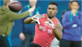  ?? MICHAEL CONROY/AP ?? At 6-2 and 220 pounds, Mississipp­i wide receiver Jonathan Mingo is an imposing target who can work out of the slot and make tough catches in traffic.