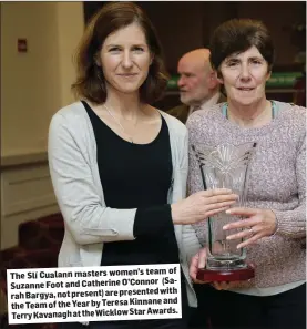  ??  ?? team of The Slí Cualann masters women’s
(SaSuzanneF­oot andCatheri­neO’Connor with rahBargya, not present) are presented the Team of theYear by TeresaKinn­aneand Terry Kavanagh atthe WicklowSta­rAwards.