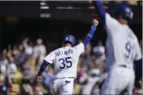  ?? ASHLEY LANDIS — THE ASSOCIATED PRESS ?? The Dodgers’ Cody Bellinger celebrates as he scores on a walk-off double hit by Gavin Lux to beat the Phillies 5-4 Sunday at Chavez Ravine.