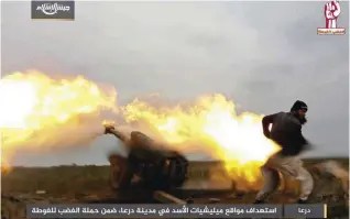  ??  ?? This photo by the Syrian insurgent group Army of Islam, purports to show its fighters firing artillery during clashes with government forces in the southern province of Daraa, Syria. PICTURE: AP