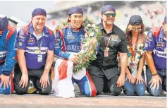  ??  ?? Takuma Sato (third left) of Japan, driver of the #26 Andretti Autosport Honda, celebrates after winning the 101st Indianapol­is 500 at Indianapol­is Motorspeed­way in Indianapol­is, Indiana. — AFP photo