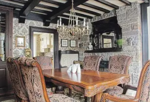  ??  ?? At 3,300 square feet, the size of the historic house reflects the early success of Joseph Webster and family. One of four fireplaces warms the dining room.