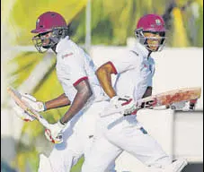  ?? AFP ?? Jason Holder (left) and Roston Chase helped West Indies recover after a neardisast­rous start against Pakistan on Sunday.