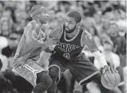  ?? [AP PHOTO] ?? Cleveland Cavaliers’ Kyrie Irving, right, looks to drive against Boston Celtics’ Isaiah Thomas during the first half of an NBA game Nov. 3 in Cleveland.