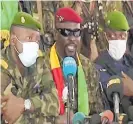  ?? Photo / AP ?? Colonel Mamady Doumbouya, centre, addresses officials in the capital Conakry of Guinea.