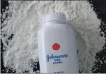  ?? JUSTIN SULLIVAN — GETTY IMAGES ARCHIVES ?? All existing inventory of Johnson & Johnson’s talc-based powders will continue to be sold through retailers until supplies run out.