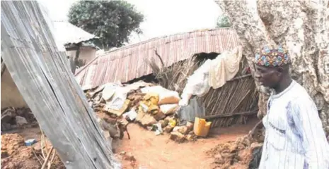  ??  ?? A victim in his house destroyed by flood in Kirfi LGA, Bauchi State