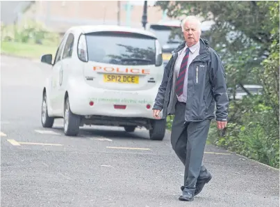  ??  ?? Geoffrey Turner arrives at Forfar Sheriff Court where he had sentence deferred for six months after pleading guilty to an amended charge.