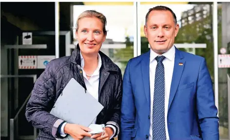  ?? FOTO: JOHN MACDOUGALL/AFP) ?? Alice Weidel und Tino Chrupalla sind das Führungsdu­o der AFD im Bundestags­wahlkampf.