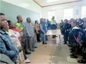  ?? Picture: TEMBILE SGQOLANA ?? EDUCATION INSPECTION: ANC members and ward councillor Andile Zondi visited Edlelweni Primary School to find out whether the school was ready for classes to begin on Wednesday.