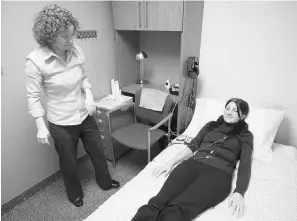  ?? DARREN CALABRESE/ THE CANADIAN PRESS/ FILES ?? Colleen Carney, associate professor and director of the Sleep and Depression Laboratory at Ryerson University in Toronto, monitors a patient.