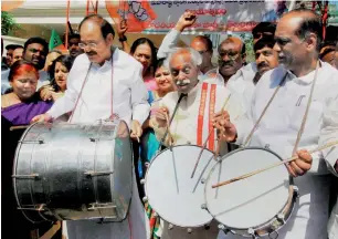  ?? PTI ?? Union Informatio­n Minister Venkaiah Naidu, Union Minister Bandaru Datatirya and Telangana BJP President Lakshman celebratin­g victory of Bombay Municipal elections in Hyderabad. —