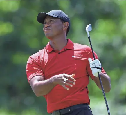  ??  ?? Tiger Woods tees off on the 18th hole during the final round of The Memorial golf tournament June 3 at Muirfield Village Golf Club. AARON DOSTER/USA TODAY SPORTS