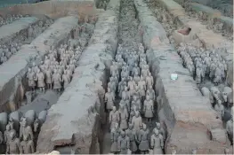  ??  ?? The Terracotta Army buried in the pits next to Qin Shi Huang’s tomb