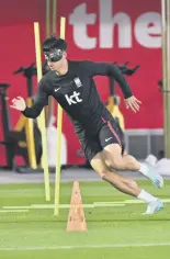  ?? ?? South Korea’s Heung-min Son attends a training session in Doha, Qatar, Nov. 22, 2022.