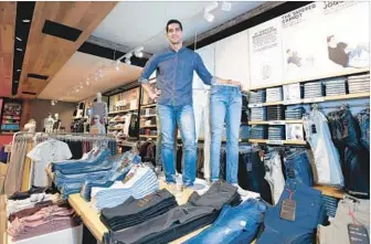  ?? Glenn Koenig Los Angeles Times ?? MARK PAN, the head of Cotton On Group’s U.S. operations, visits the Cotton On store at Del Amo Fashion Center in Torrance. The Australian retail giant has about 40 stores in Southern California.