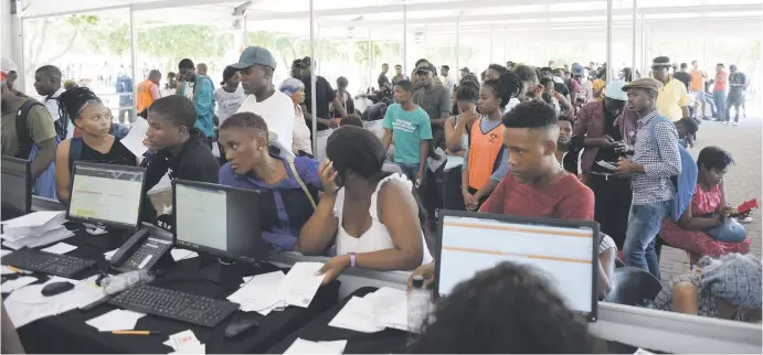  ?? Picture: Refilwe Modise ?? QUEUING UP. Prospectiv­e students stand in long lines to register at the University of Johannesbu­rg yesterday.