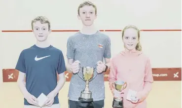  ??  ?? 0 The Mcdougall siblings – left to right, Findlay, Ruadhri and Orla – line up with their prizes.