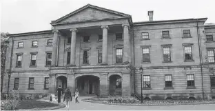  ?? FILE PHOTO ?? A dozen students in Holland College's heritage retrofit carpentry program will be renovating two of the several large windows prominentl­y located on the first floor of Province House facing Richmond Street.