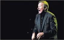  ?? CHARLES SYKES/ THE ASSOCIATED PRESS FILE ?? Comedian Robin Williams performs at a benefit concert for injured military service members and veterans in November 2012 in New York.