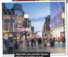  ??  ?? Night falls, but Leicester Square remains as bustling as ever