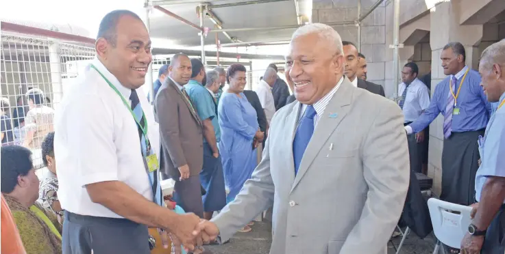  ?? Photo: Ronald Kumar ?? Prime Minister Voreqe Bainimaram­a with Rev. Lepani Saqa of Kiuva, Bau during the Methodist Church annual conference at Centenary Church on August 21, 2018.