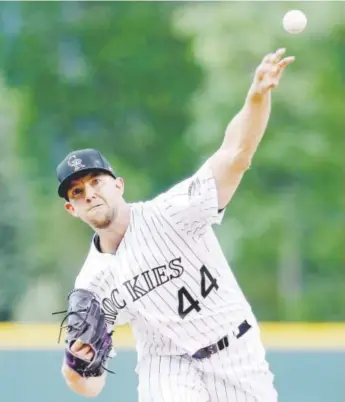  ?? Matthew Stockman, Getty Images ?? Rockies lefty Tyler Anderson, pitching Saturday against the Diamondbac­ks, improved his record to 2-3 and lowered his ERA to 6.69. He had 10 strikeouts in six innings.