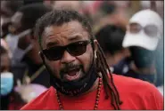  ?? (AP/Morry Gash) ?? Justin Blake, uncle of Jacob Blake, speaks during a community gathering Tuesday in Kenosha, Wis., at the site where Jacob Blake was shot by a police officer. “We don’t need more pain and division from a president set on advancing his campaign at the expense of our city,” Justin Blake said in a statement. “We need justice and relief for our vibrant community.”