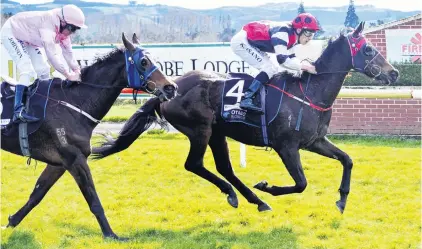  ?? PHOTO: JONNY TURNER ?? Back and firing . . . Lochan Ora and rider Kozzi Asano win the South Otago Cup over Just Push Play and Chris Johnson at the Otago Racing Club meeting at Wingatui yesterday.